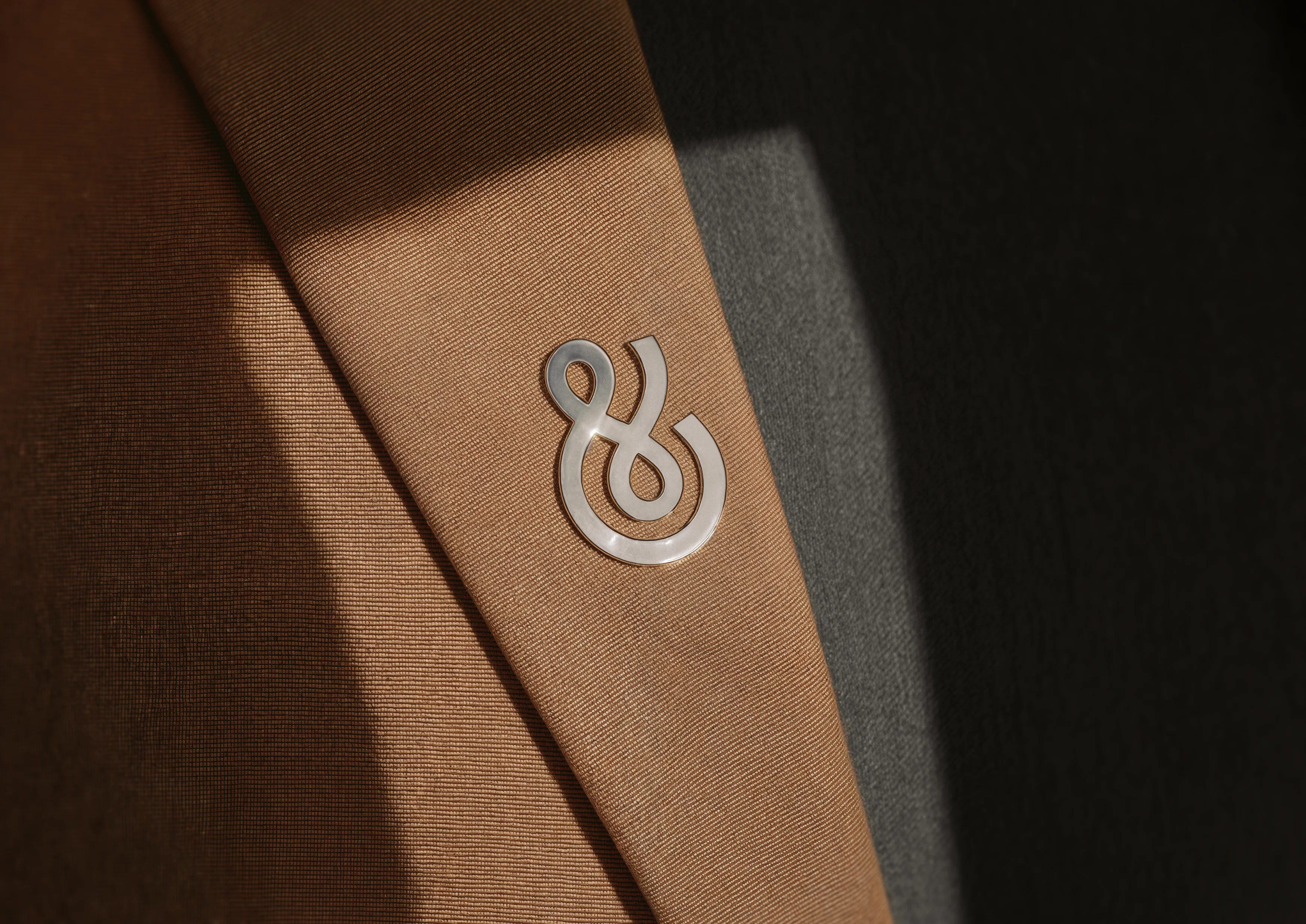 Pin badge for Outten & Golden.